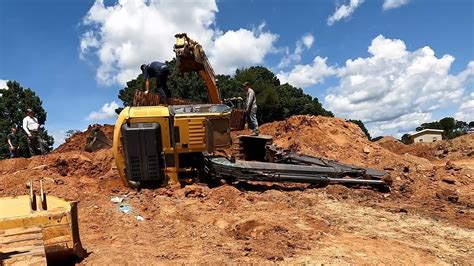 flipped over mini excavator|tip over excavator recovery.